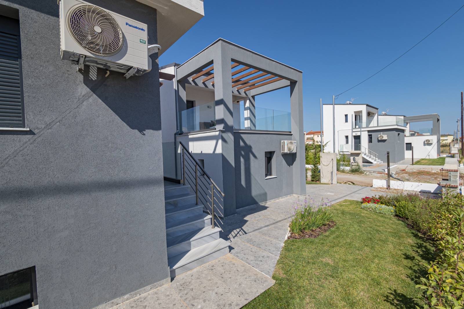 Luxurious exterior design of Asteria Mare with pool