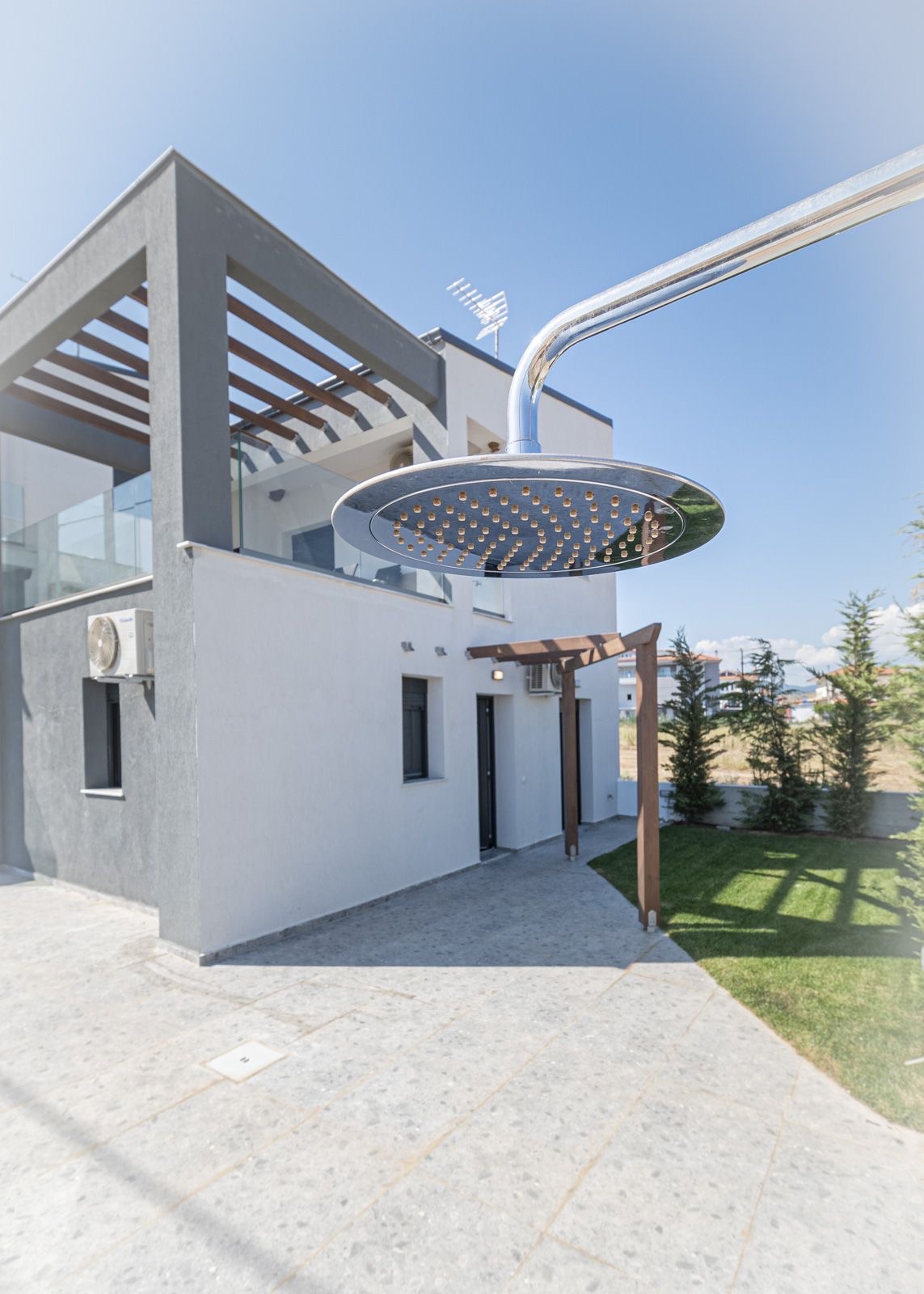 Charming exterior design of Asteria Mare with garden