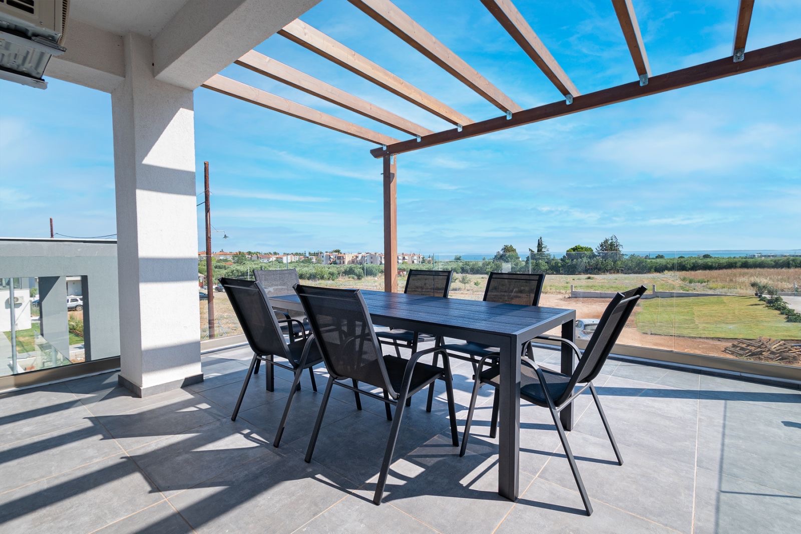 Charming exterior design of Asteria Mare with garden